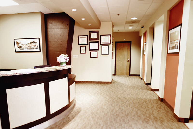 Front desk and hallway leading to the dental suites.