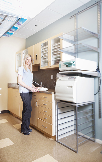 A staff member working in front of a counter